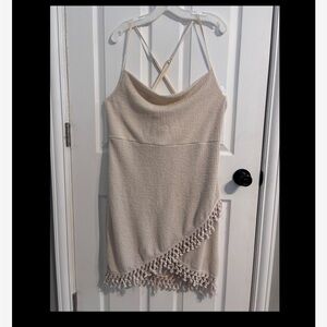 Chic Beige Knit Dress with Tassel Hem